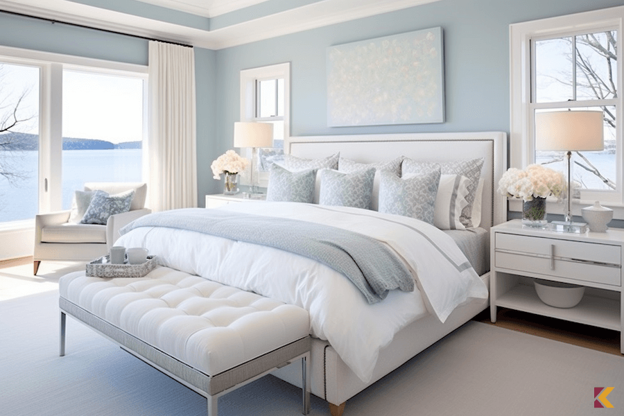 Sypialnia minimalistyczna, błękitne ściany w białej aranżacji