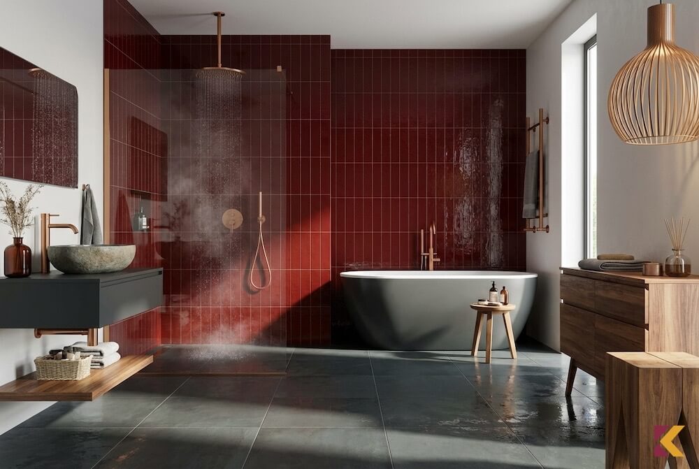 Nowoczesna łazienka z bordowymi płytkami i miedzianą armaturą